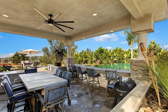 17180 Mockingbird Canyon Rd, Riverside, CA 92504 - view of patio with a ceiling fan and outdoor dining area