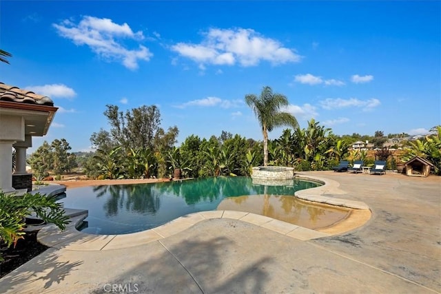 17180 Mockingbird Canyon Rd, Riverside, CA 92504 - view of pool with a patio and a pool with connected hot tub