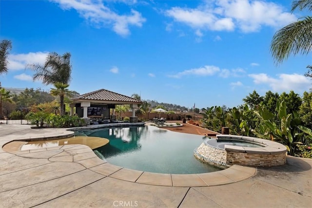 17180 Mockingbird Canyon Rd, Riverside, CA 92504 - view of swimming pool featuring a gazebo, a patio, and a pool with connected hot tub