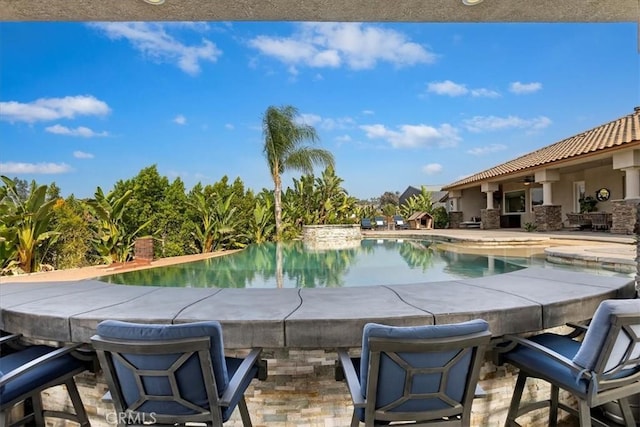 17180 Mockingbird Canyon Rd, Riverside, CA 92504 - view of pool featuring a patio area and an infinity pool