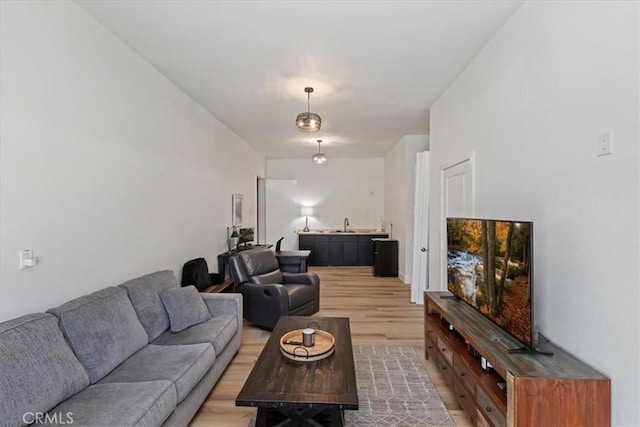 17180 Mockingbird Canyon Rd, Riverside, CA 92504 - living area featuring light wood finished floors