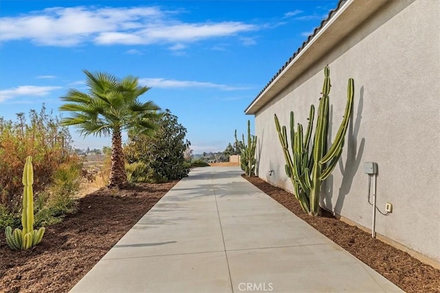 17180 Mockingbird Canyon Rd, Riverside, CA 92504 - view of property's community featuring a patio area