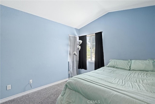 566 Bruin Dr, Riverside, CA 92507 - carpeted bedroom with vaulted ceiling and baseboards