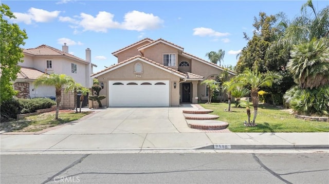 566 Bruin Dr, Riverside, CA 92507 - mediterranean / spanish-style house featuring stucco siding, an attached garage, a front lawn, concrete driveway, and a tile roof