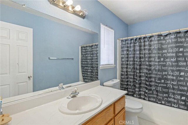 566 Bruin Dr, Riverside, CA 92507 - bathroom with vanity and shower / bathtub combination with curtain