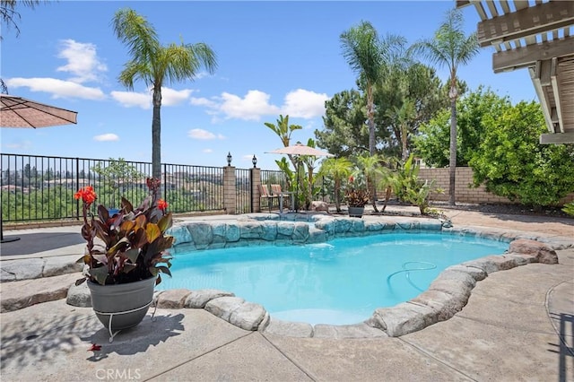 566 Bruin Dr, Riverside, CA 92507 - view of swimming pool featuring a fenced backyard