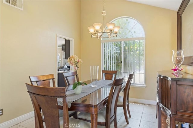 566 Bruin Dr, Riverside, CA 92507 - dining area with a chandelier and light tile patterned flooring