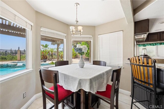 566 Bruin Dr, Riverside, CA 92507 - dining room with a chandelier and light tile patterned flooring