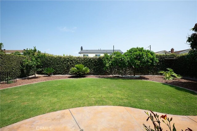 5302 Bryant Cir, Westminster, CA 92683 - fenced backyard with a patio