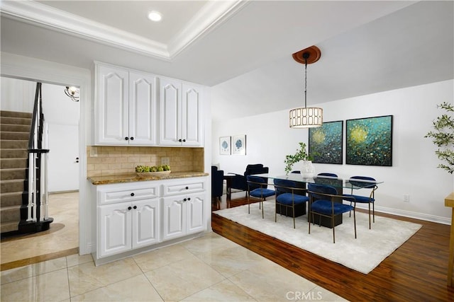 5302 Bryant Cir, Westminster, CA 92683 - dining space with stairs, recessed lighting, and a tray ceiling