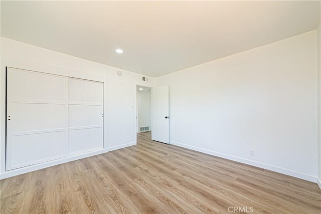 1510 W 147th St, Gardena, CA 90247 - unfurnished bedroom with light wood-style flooring, a closet, and recessed lighting