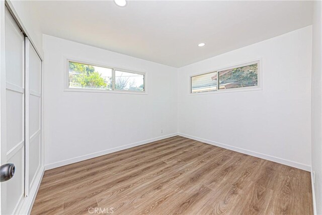 1510 W 147th St, Gardena, CA 90247 - unfurnished bedroom featuring light wood-style floors, a closet, and recessed lighting