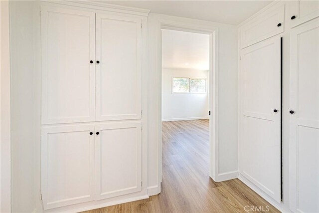1510 W 147th St, Gardena, CA 90247 - corridor featuring light wood-style flooring and baseboards