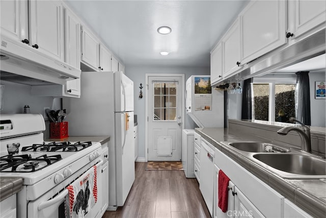 22524 Paseo Terraza, Saugus, CA 91350 - kitchen featuring white appliances, under cabinet range hood, white cabinets, wood finished floors, and recessed lighting