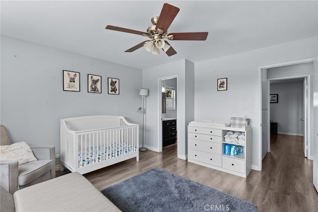 22524 Paseo Terraza, Saugus, CA 91350 - bedroom with wood finished floors, ceiling fan, and a crib