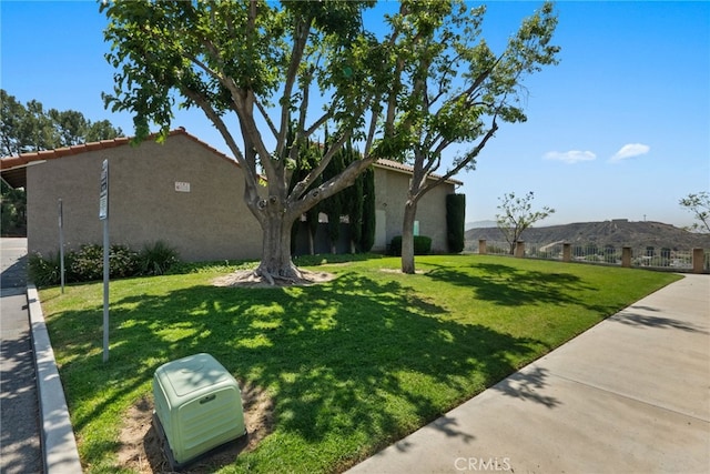 22524 Paseo Terraza, Saugus, CA 91350 - view of front of home with stucco siding and a front lawn