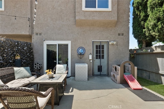 22524 Paseo Terraza, Saugus, CA 91350 - back of house featuring stucco siding and a patio