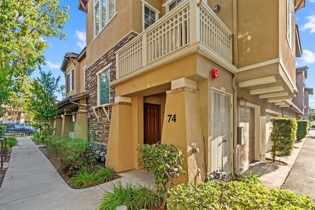 74 Garrison Loop, Ladera Ranch, CA 92694 - view of property with an attached garage