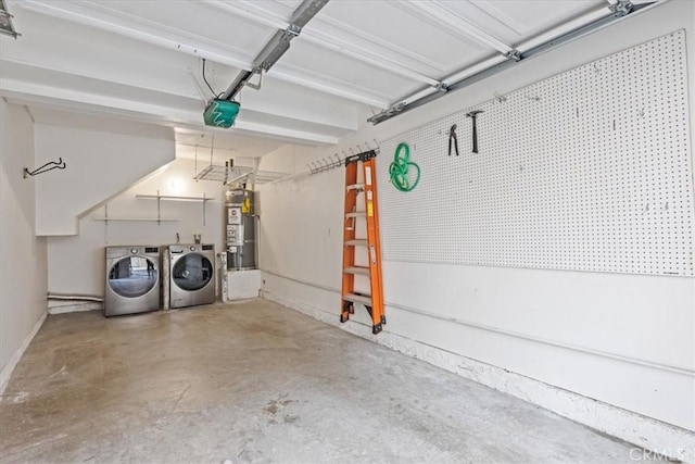 74 Garrison Loop, Ladera Ranch, CA 92694 - garage featuring washer and dryer, strapped water heater, and a garage door opener