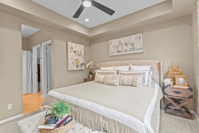 74 Garrison Loop, Ladera Ranch, CA 92694 - carpeted bedroom with a raised ceiling and ceiling fan
