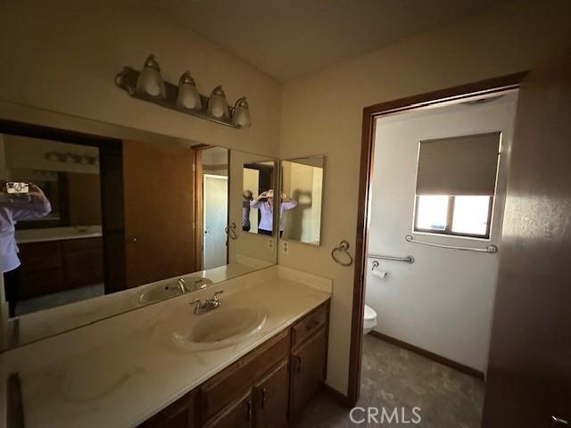 27208 Cornell St, Hemet, CA 92544 - bathroom with vanity and toilet