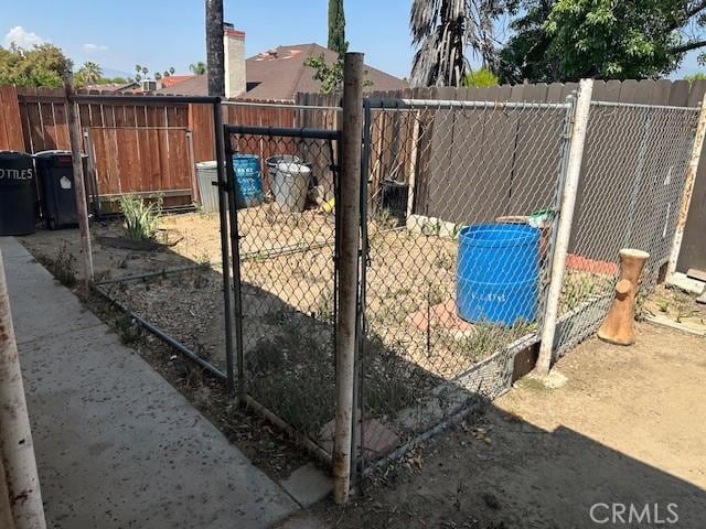 27208 Cornell St, Hemet, CA 92544 - gate featuring a fenced backyard