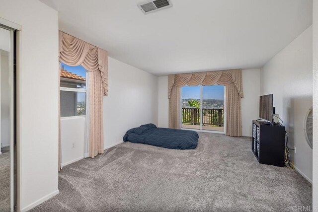 4722 Regatta Ln, San Diego, CA 92154 - carpeted bedroom featuring access to outside and baseboards