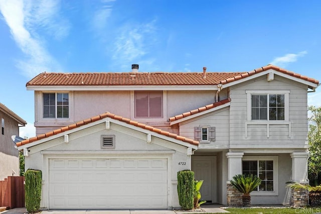 4722 Regatta Ln, San Diego, CA 92154 - view of front facade featuring a tiled roof, concrete driveway, a garage, and stucco siding