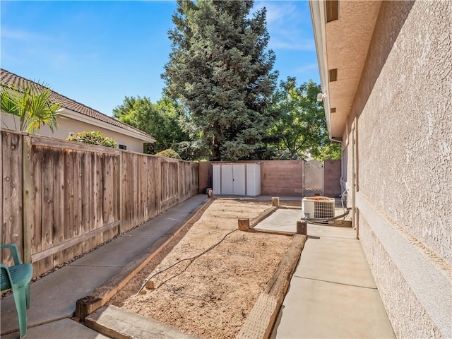 6660 N St Catherine Ct, Fresno, CA 93711 - fenced backyard with a storage unit and a patio area