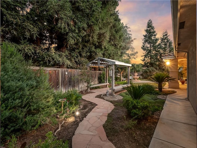 6660 N St Catherine Ct, Fresno, CA 93711 - yard at dusk featuring a gazebo