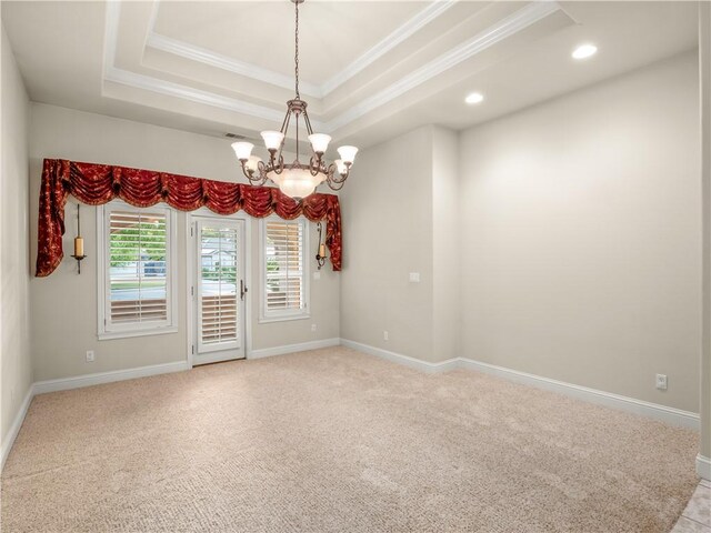 6660 N St Catherine Ct, Fresno, CA 93711 - unfurnished room featuring ornamental molding, a raised ceiling, light colored carpet, a chandelier, and recessed lighting
