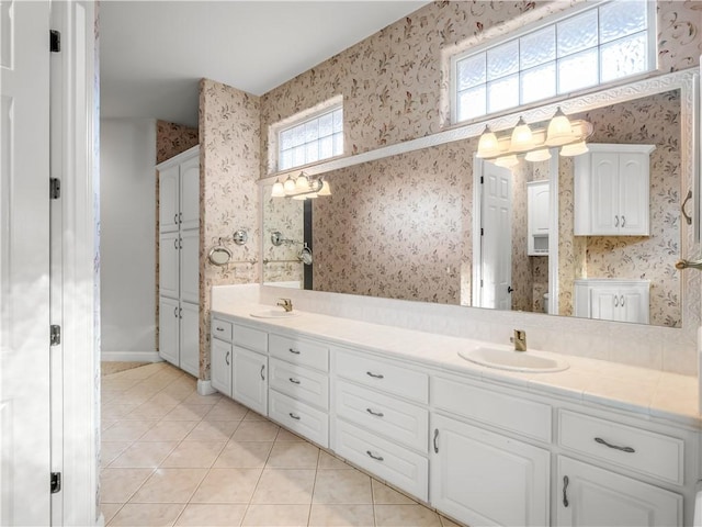6660 N St Catherine Ct, Fresno, CA 93711 - bathroom with double vanity, tile patterned flooring, and wallpapered walls