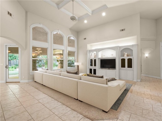 6660 N St Catherine Ct, Fresno, CA 93711 - living area with a towering ceiling, coffered ceiling, arched walkways, recessed lighting, and beamed ceiling