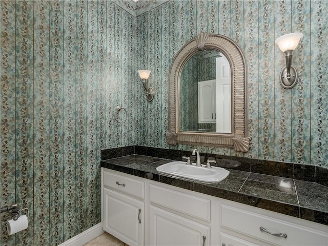 6660 N St Catherine Ct, Fresno, CA 93711 - bathroom featuring wallpapered walls and vanity