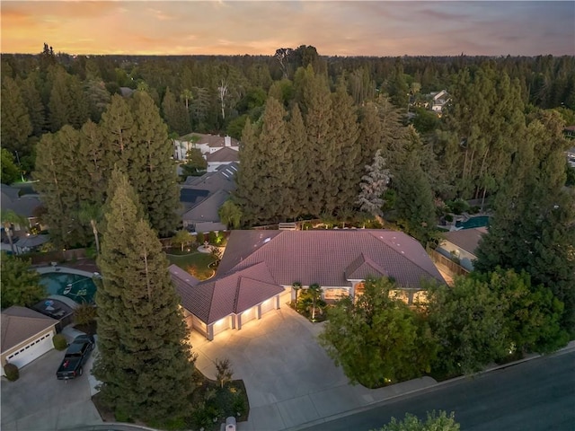 6660 N St Catherine Ct, Fresno, CA 93711 - view of subject property with a heavily wooded area