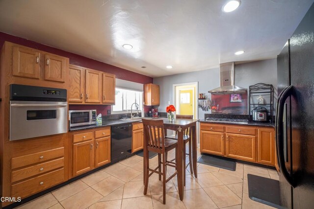 1742 Forar Cir, Camarillo, CA 93010 - kitchen with black appliances, ventilation hood, dark countertops, light tile patterned floors, and recessed lighting