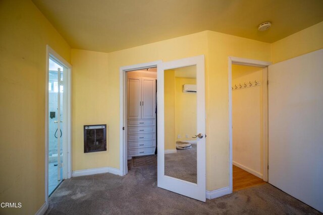 1742 Forar Cir, Camarillo, CA 93010 - corridor featuring heating unit, carpet flooring, and an AC wall unit