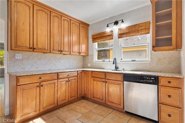 3007 Park Way, Bakersfield, CA 93304 - kitchen with stainless steel dishwasher, plenty of natural light, and light stone countertops