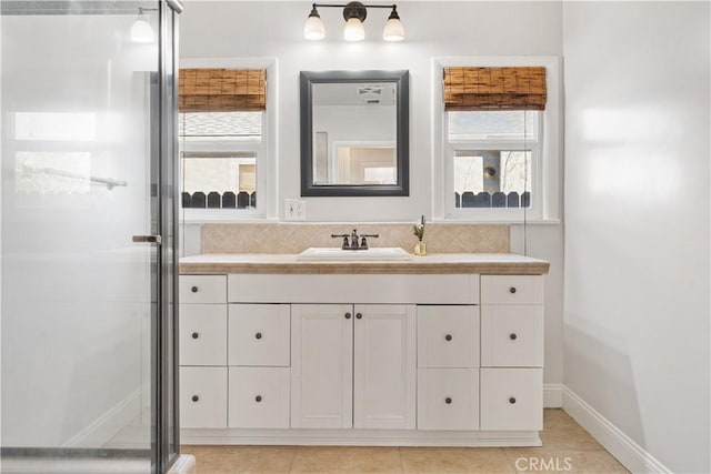 3007 Park Way, Bakersfield, CA 93304 - bathroom with vanity, a stall shower, tile patterned flooring, and tasteful backsplash