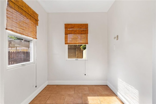 3007 Park Way, Bakersfield, CA 93304 - spare room with baseboards and light tile patterned floors