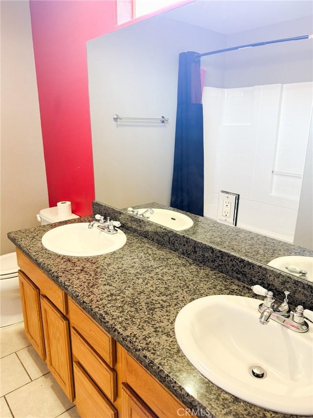 6025 Abronia Ave Unit 29, Palms, CA 92277 - bathroom featuring double vanity and tile patterned floors