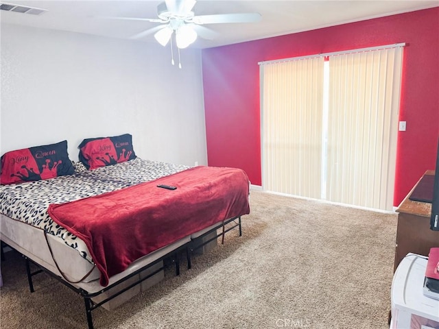 6025 Abronia Ave Unit 29, Palms, CA 92277 - carpeted bedroom with ceiling fan