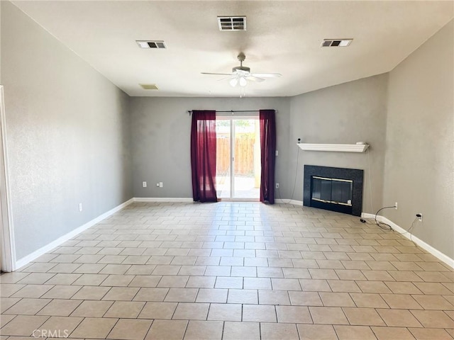 6025 Abronia Ave Unit 29, Palms, CA 92277 - unfurnished living room featuring a ceiling fan and a fireplace