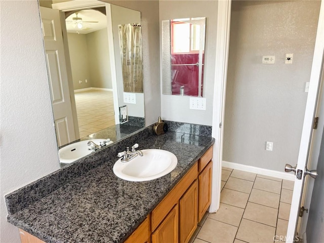 6025 Abronia Ave Unit 29, Palms, CA 92277 - bathroom featuring vanity, ceiling fan, and tile patterned floors