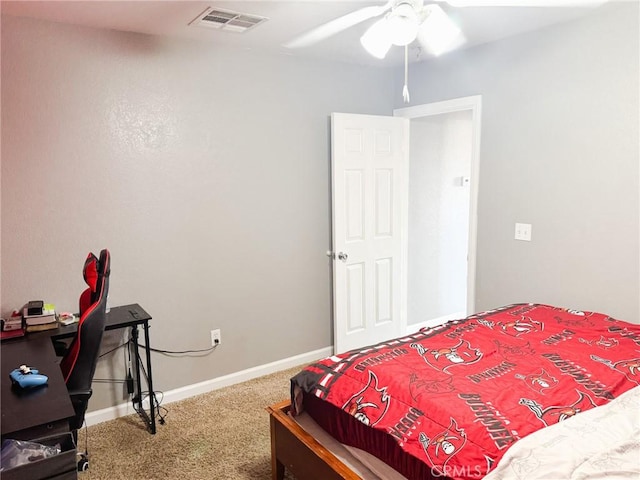 6025 Abronia Ave Unit 29, Palms, CA 92277 - bedroom featuring carpet floors, a desk, and ceiling fan