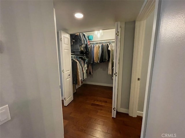 3641 S Bear St Unit F, Santa Ana, CA 92704 - spacious closet featuring dark wood finished floors