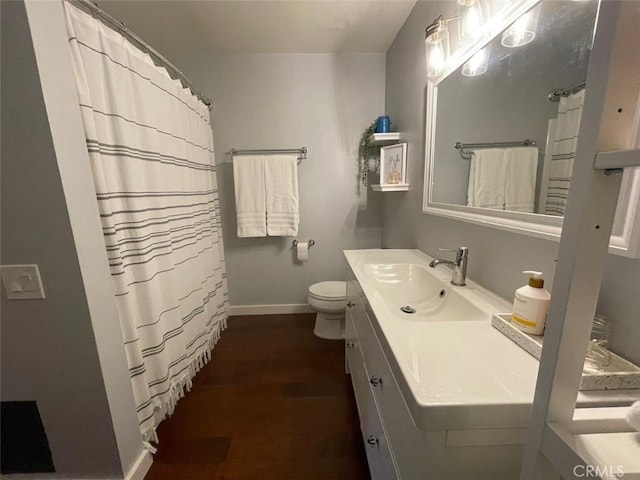 3641 S Bear St Unit F, Santa Ana, CA 92704 - full bathroom with vanity, wood finished floors, and a shower with shower curtain
