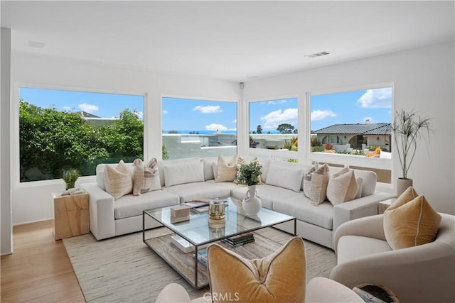 32512 Seven Seas Dr, Dana Point, CA 92629 - living area featuring healthy amount of natural light and light wood finished floors