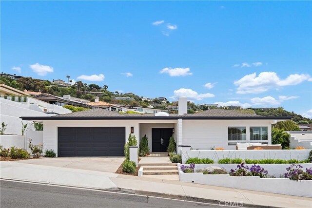 32512 Seven Seas Dr, Dana Point, CA 92629 - view of front facade with a garage and driveway