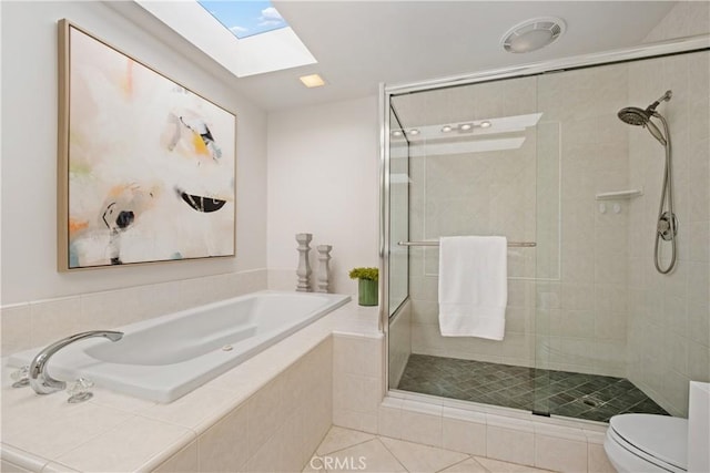 32512 Seven Seas Dr, Dana Point, CA 92629 - full bathroom featuring a skylight, a bath, a stall shower, and tile patterned flooring